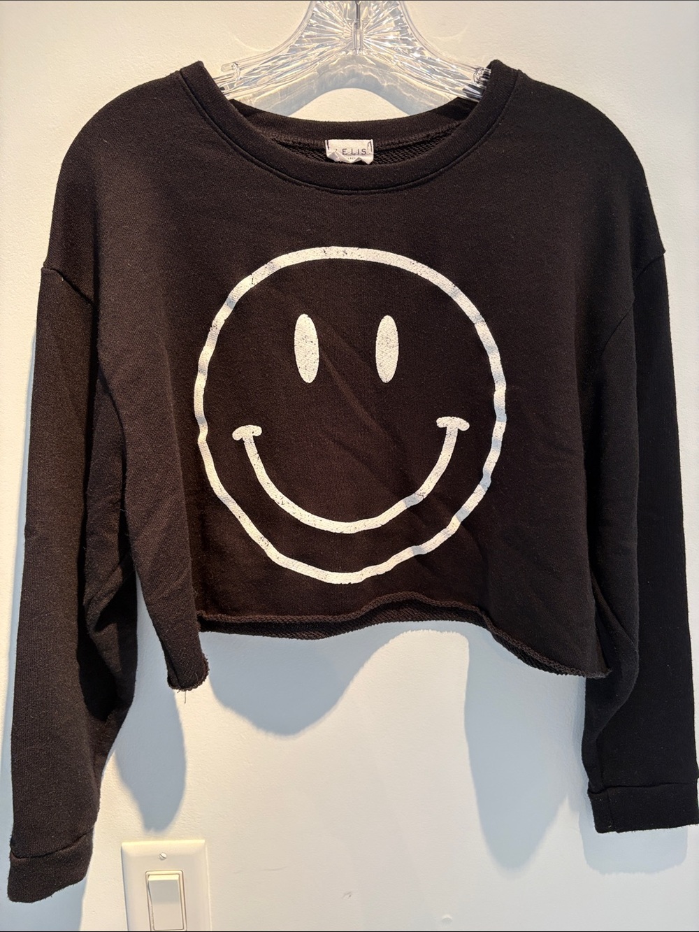 dELiA*s Black Cropped Sweatshirt with White Smiley